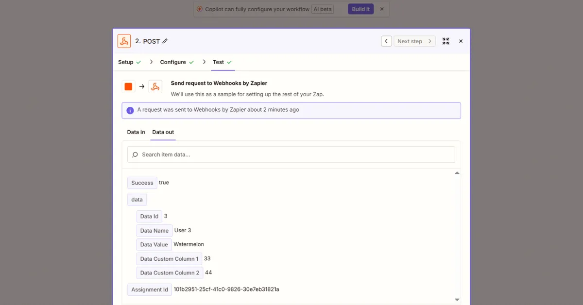 Zapier test step results showing successful Robin Router response with Success true, Data Name, Data Value, and Assignment ID fields